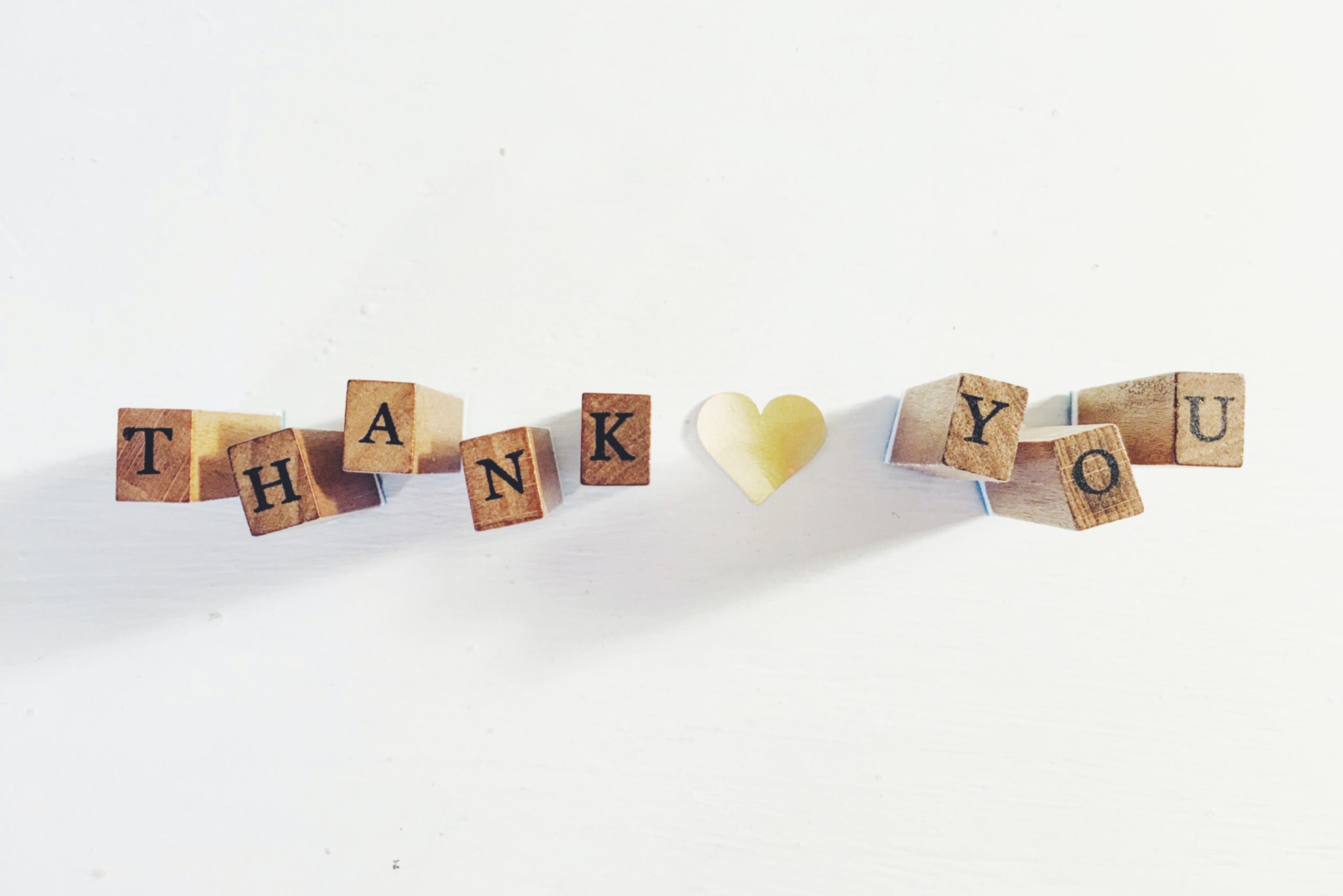 Blocks that spell out 'Thank You' with a heart in the middle