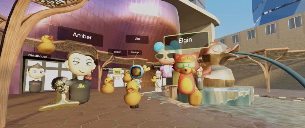 A screenshot from a Mozilla Hubs space shows a group of human and animal characters. 