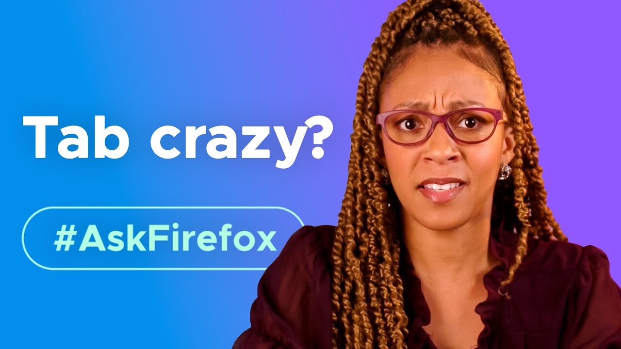 A woman wearing glasses looks at the camera with a concern look on her face. Text overlay: Tab crazy? #AskFirefox