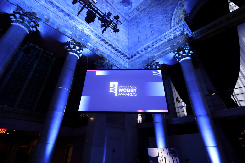 A big screen reads: 28th Annual Webby Awards