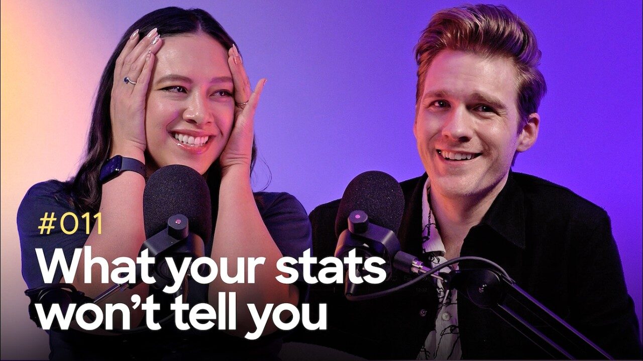 Two podcast hosts sitting in front of microphones, one smiling and the other with hands on their face, captioned "#011 What your stats won't tell you."