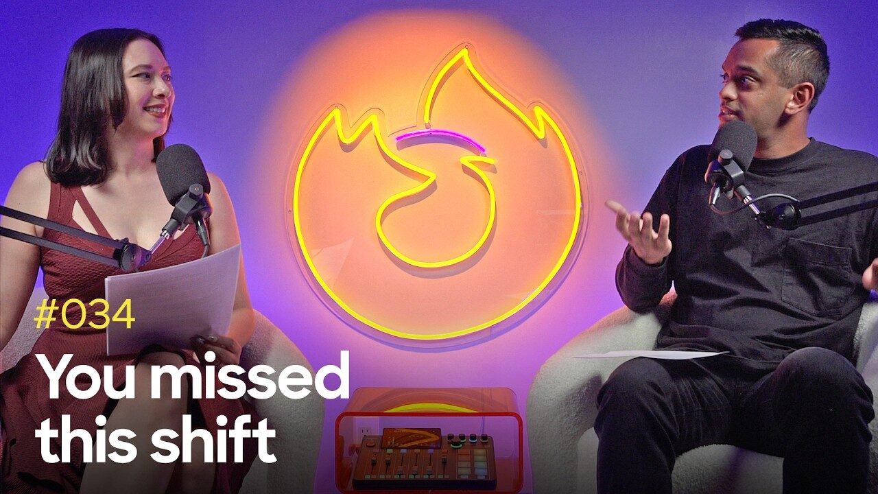 Podcast hosts in a studio talking, with a neon fox flame logo in the background and text reading “#034 You missed this shift.”