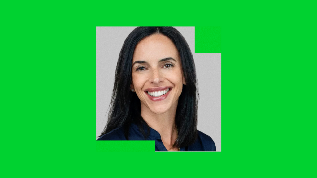 Headshot image used in a chief business officer announcement, showing a smiling executive on a bright green background.