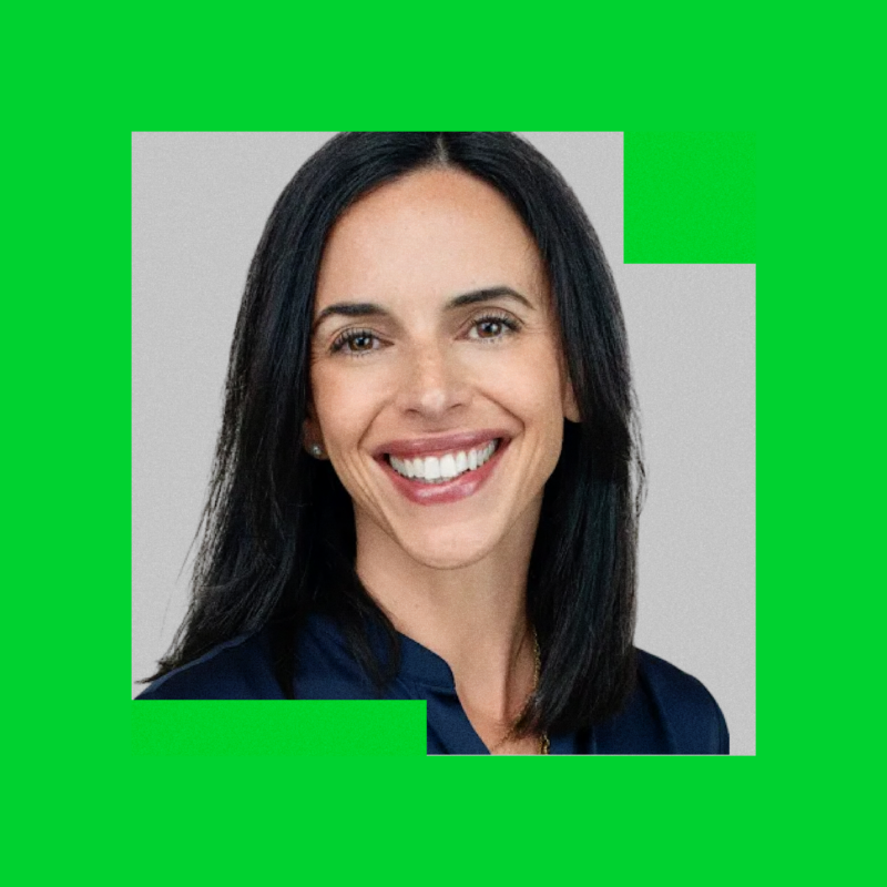 Headshot image used in a chief business officer announcement, showing a smiling executive on a bright green background.