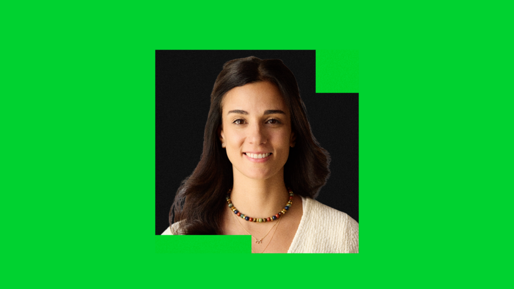 Headshot of Abigail Besdin, Mozilla COO, smiling against a dark background