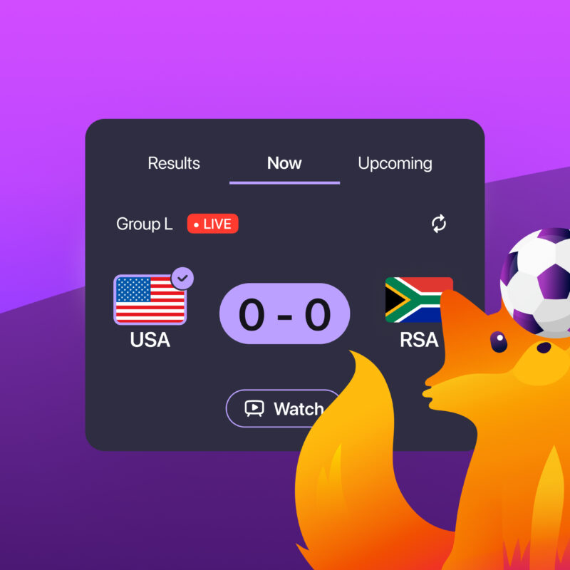Firefox fox mascot balances soccer ball beside live World Cup match score widget.